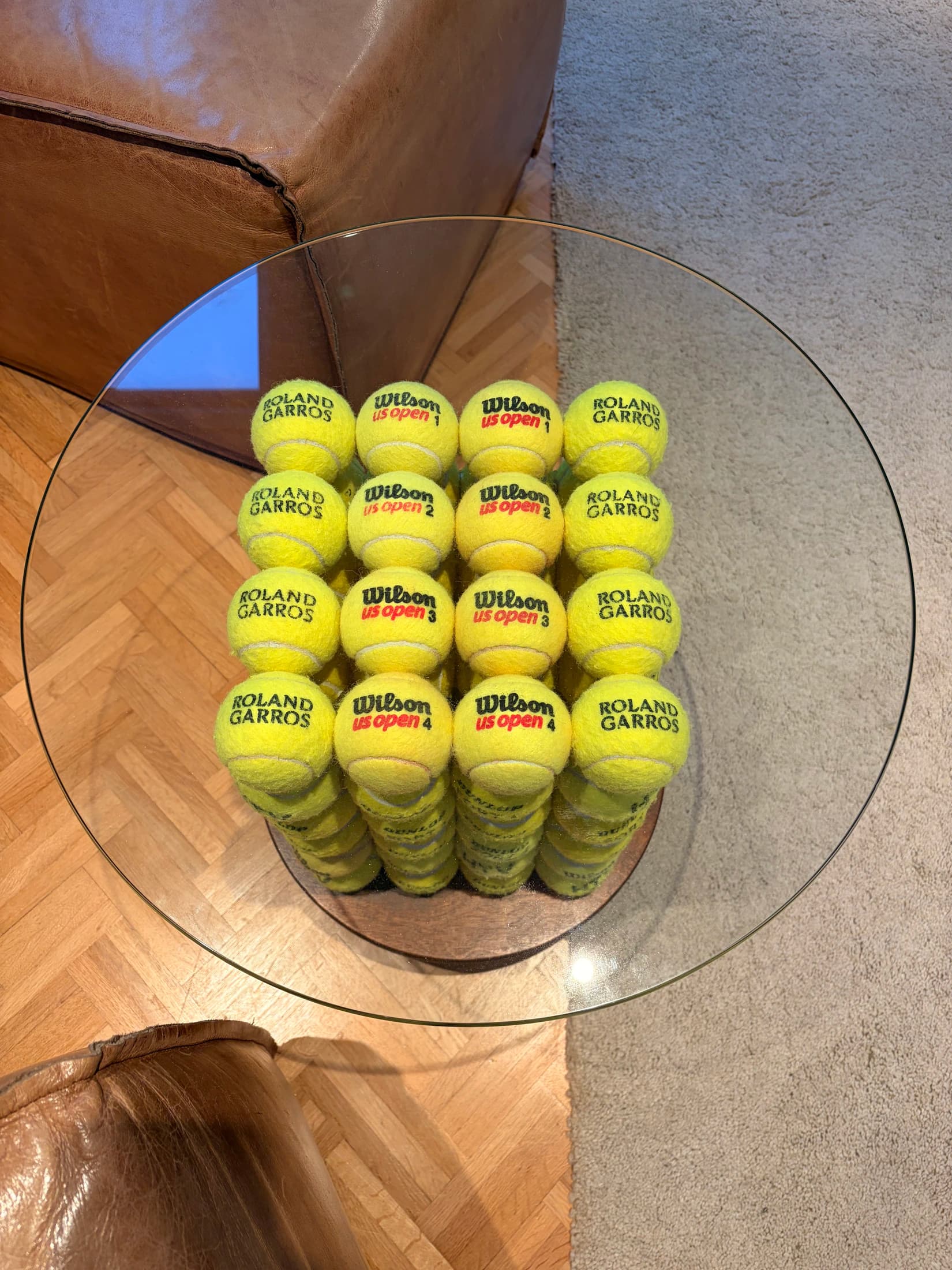 Coffee Table Boris No. 01 viewed from above, revealing its glass top and tennis-ball structure